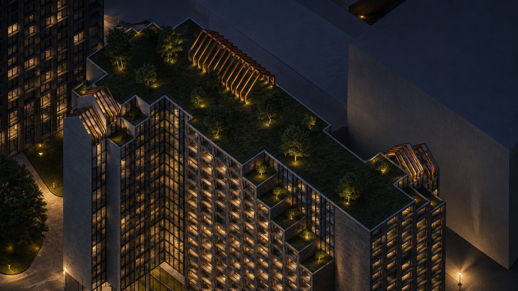Aerial night close-up — the stepped rooftop terraces glowing