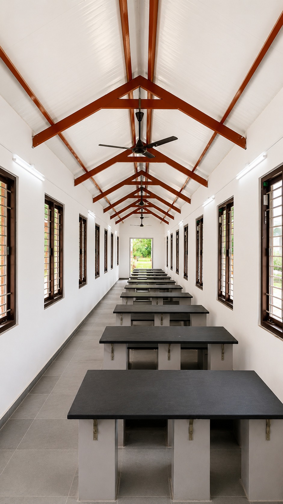 Dining hall interior — new roof trusses over dining benches
